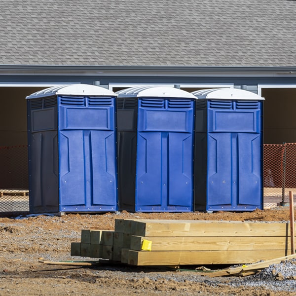 what is the cost difference between standard and deluxe portable restroom rentals in Stroud